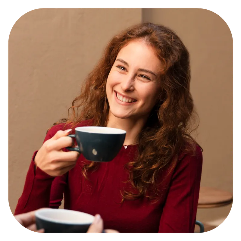 Person with cup of coffee